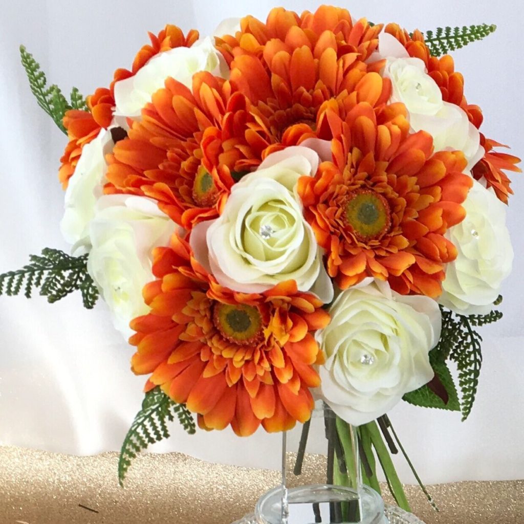 artificial silk flower bridal bouquet, hand tied posy style. orange, ivory. inc gerbera, roses, & asparagus