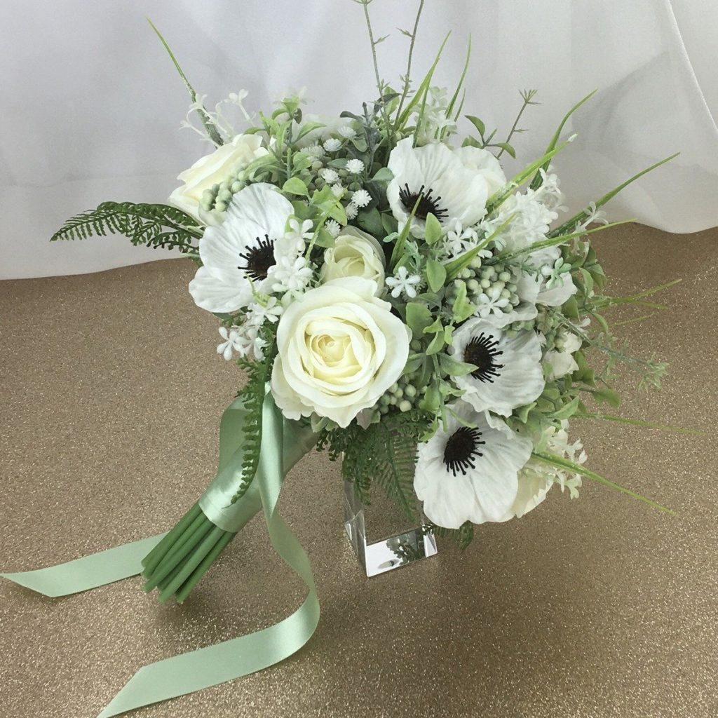 artificial silk flower brides bouquet open loose hand tied natural style. ivory, white, green available in most colours . inc meadow grass, roses, anemone, berry , fern and lambs ear