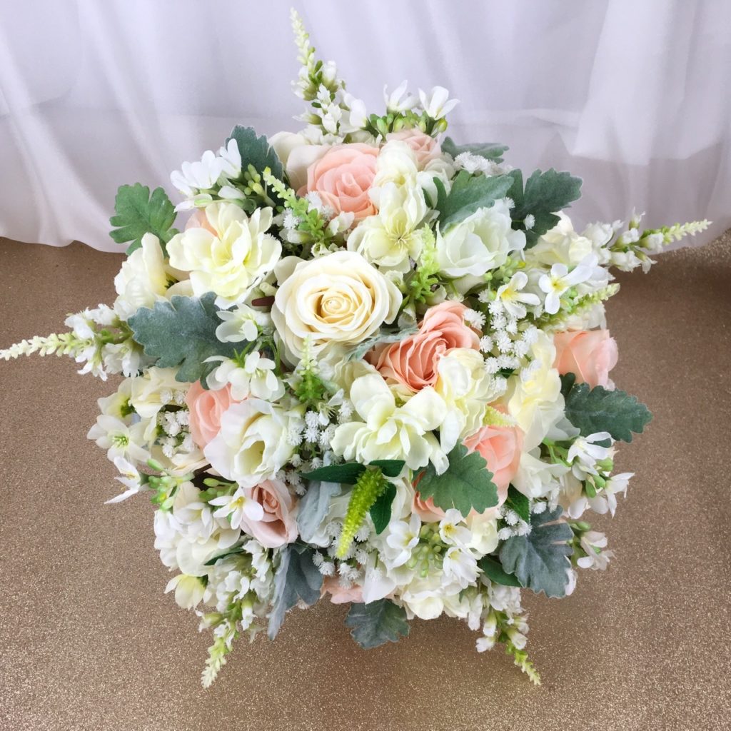 artificial silk flower bridal bouquet. hand tied posy style. ivory, cre3am, peach, apricot, vanilla, green. inc roses, gypsophila, physostegia, lissianthus & dusty miller