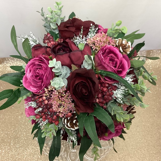 artificial silk flower brides bouquet, hand tied posy style. burgundy, reds, pink, wine, ivory available in most colours. inc open rose, peiny, berry, eucalyptus, spruce,, cones, bay leaf & eucalyptus