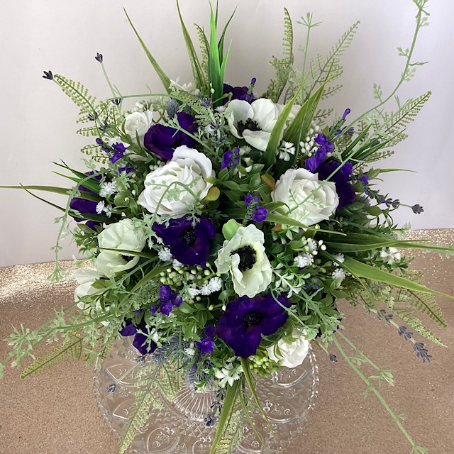 artificial silk flower bridal bouquet. loose open hand tied natural style. purple, lilac ivory, white. inc anemone, meadow grass, fern, lavender, roses, gypsophila