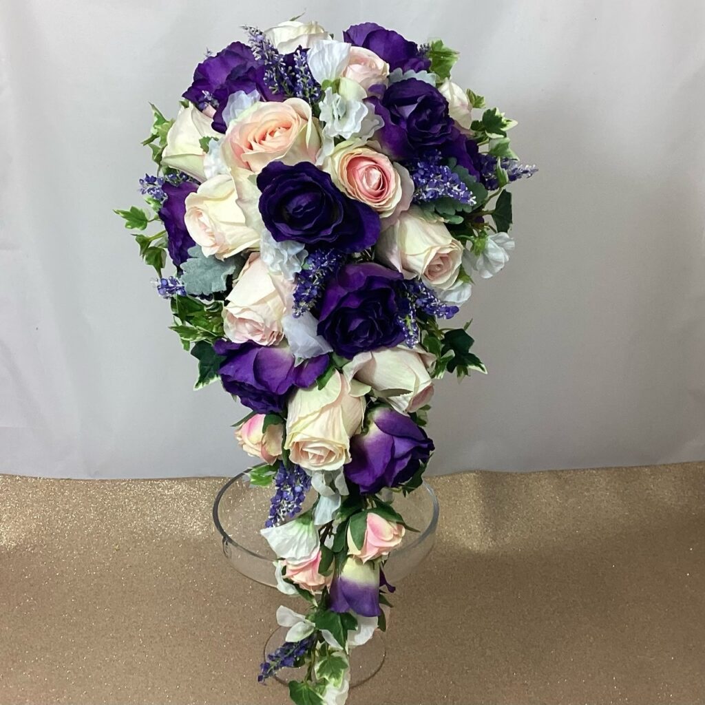 artificial silk flower bridal bouquet, teardrop design. purple., pink. lilac, ivory. inc variety of roses, veronica, astilbe , sweet pea & ivy
