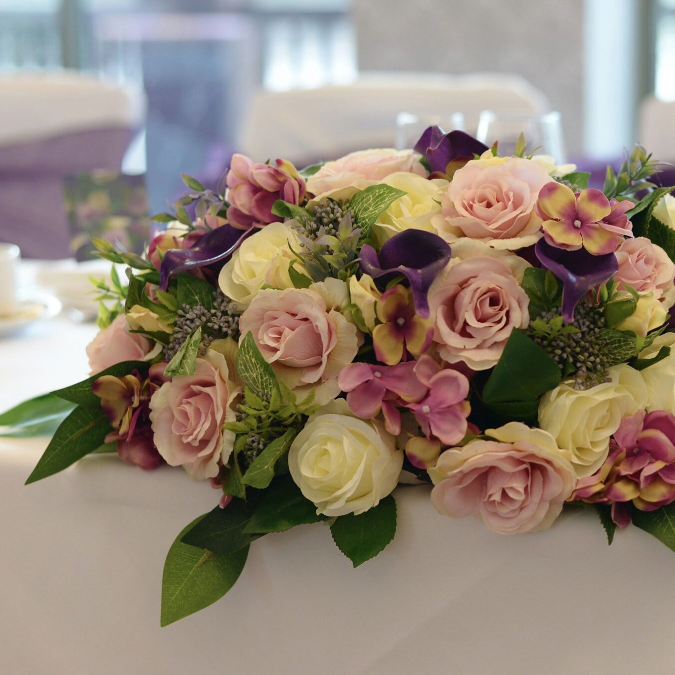 wedding top table flower arrangements